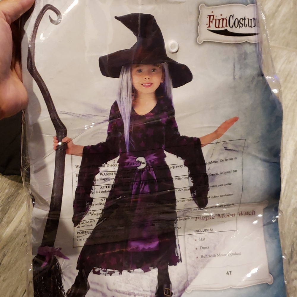 Girls witch costume with broom